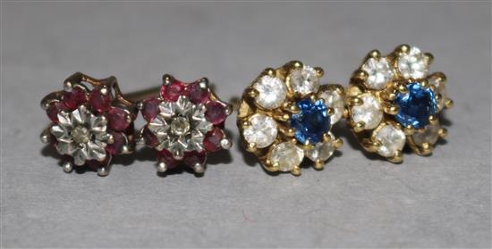 A pair of 18ct gold, sapphire and diamond cluster stud earrings and a similar pair of 9ct gold, ruby and diamond earrings